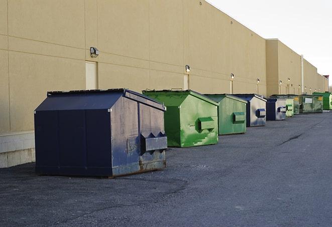 big yellow dumpsters on a construction lot in Fort Valley, VA